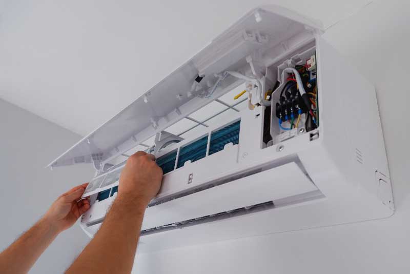 heat pump being serviced